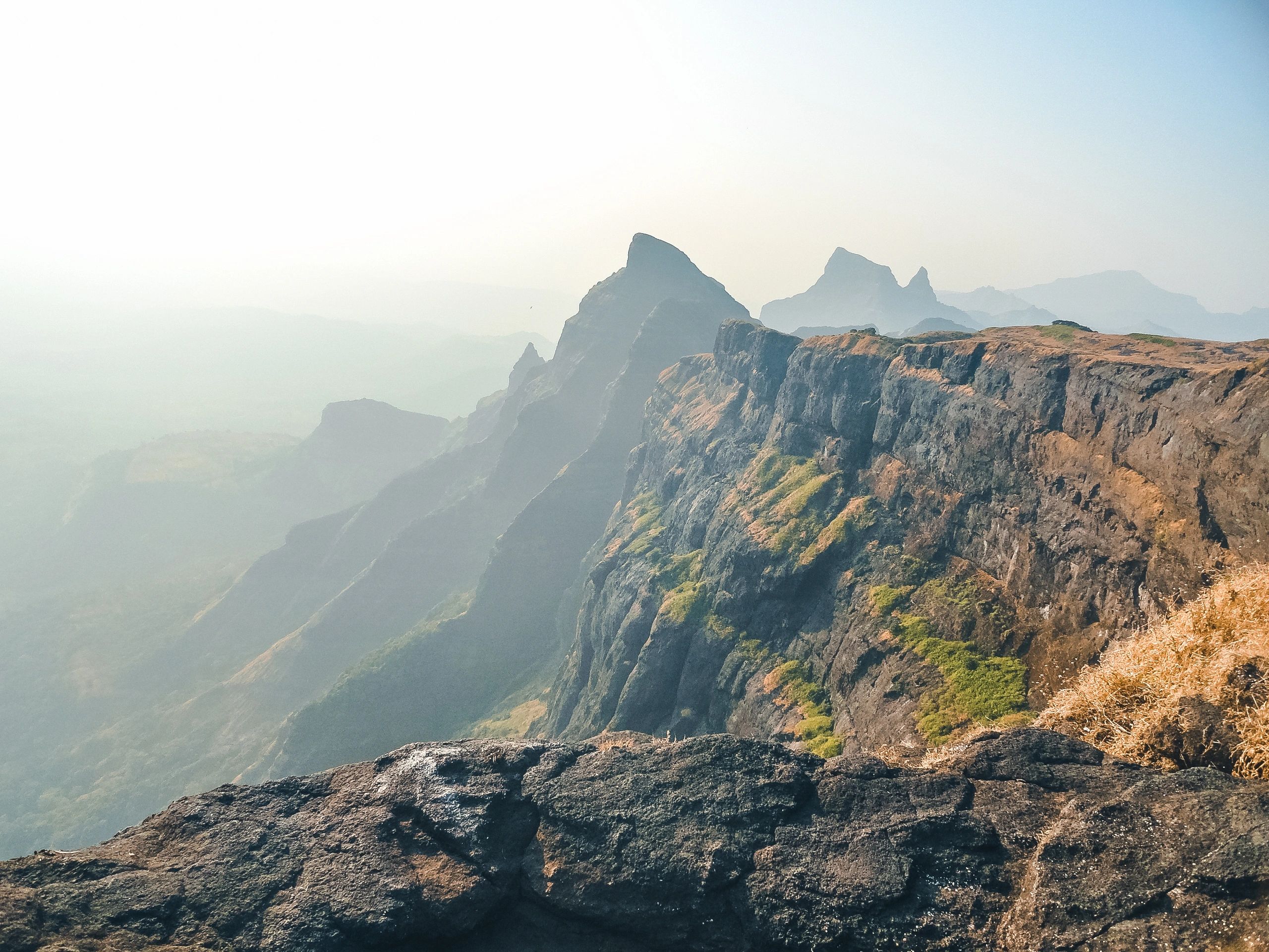 Mountain cliff viewpoint in Maharashtra with expansive valley views